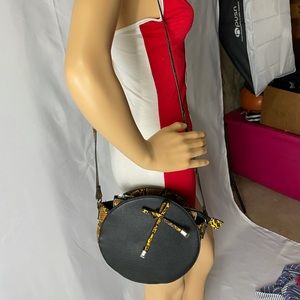 Snakeskin yellow and black small round bag